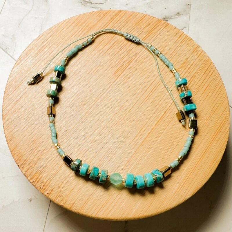 TURQUOISE THREAD BRACELET